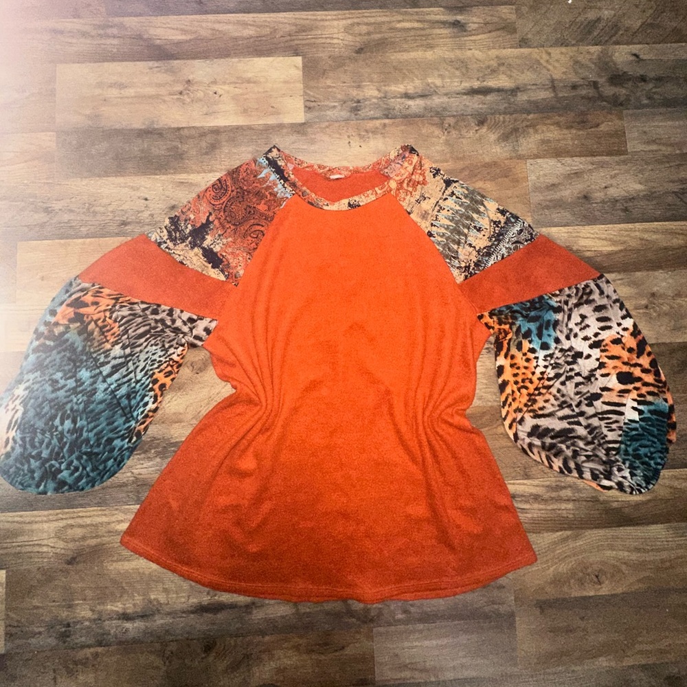 Rust Orange Top with Patterned Sleeves womans ( NO SIZE)